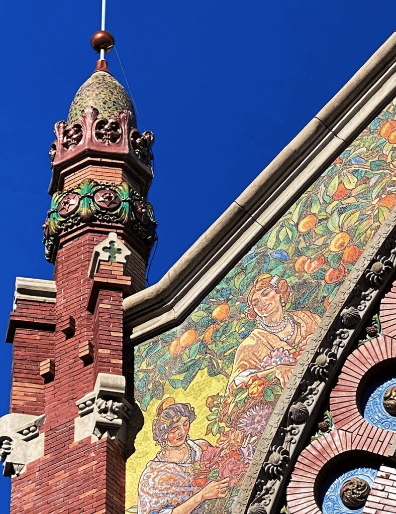 trencadis domed spire and mosaic tile mural on the Mercado de Colon in Valencia, Spain