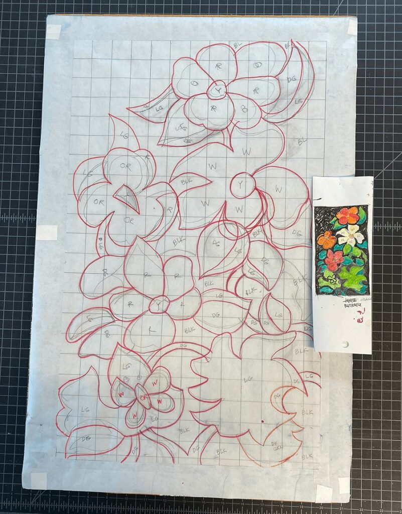 mosaic tile design enlarged on paper using the grid method